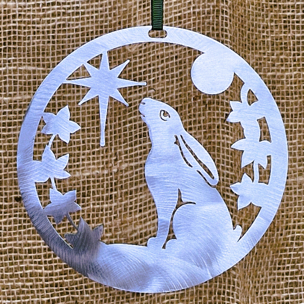 Stainless steel Christmas Hare decoration on natural hessian background
