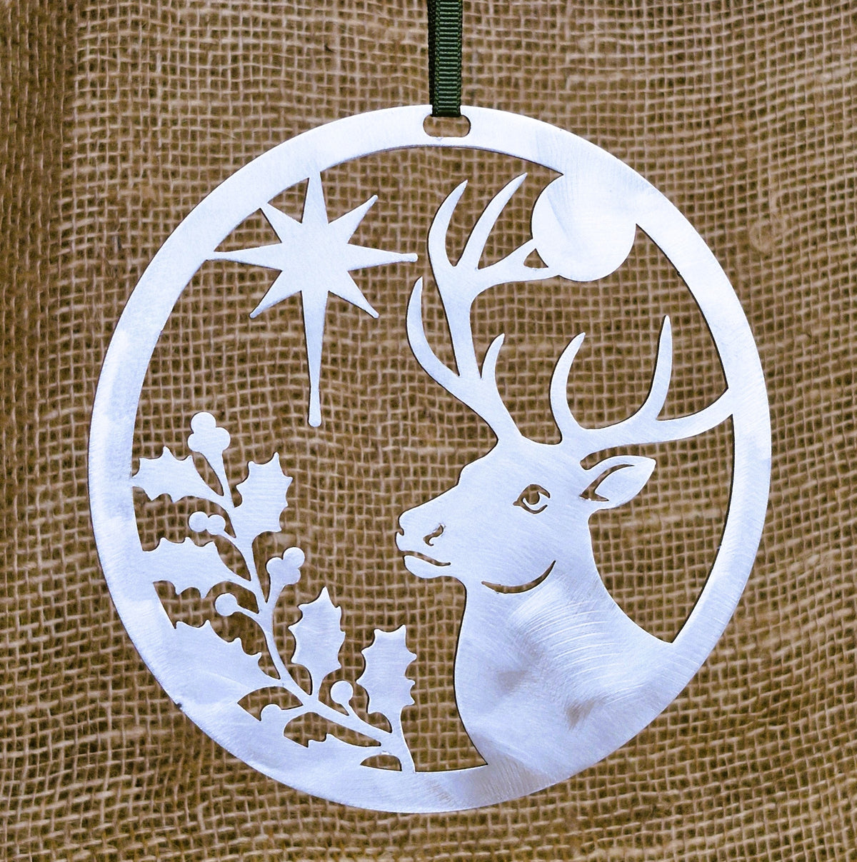 Stainless steel Christmas Stag decoration on natural hessian background