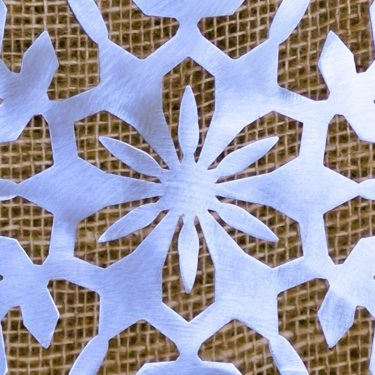 close up detail of stainless steel snowflake decoration